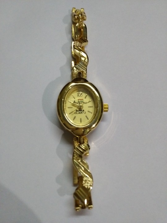 Buy Hmt Designer Golden Wrist Watch For Girls Online ₹199 from ShopClues