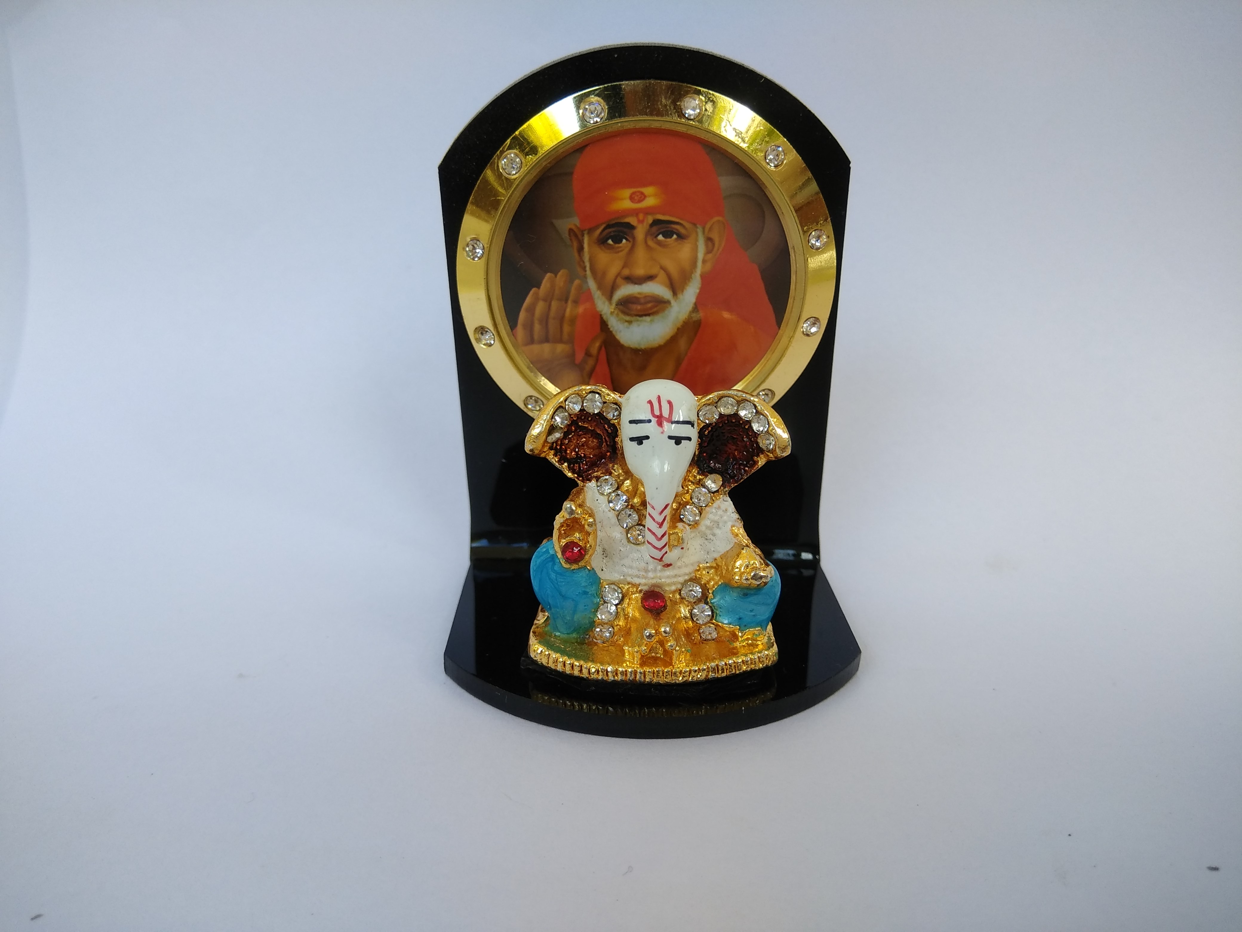 Buy Shirdi Saibaba Car Dashboard Stand Online @ ₹250 from ShopClues