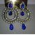 Ramleela Danglers studded with blue and white stones surrounded by pearls