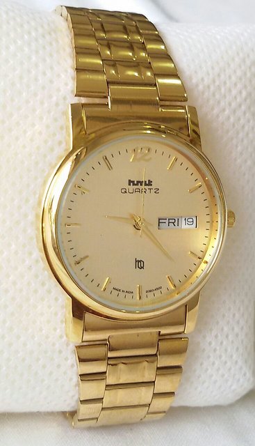 Hmt quartz gold online watch price