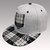 BLACK AND WHITE CHECKERED SNAP-BACK CAP