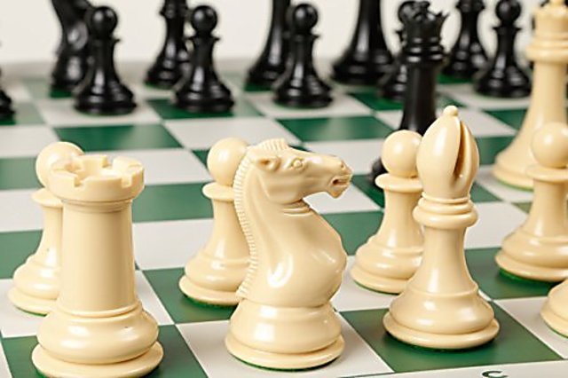 Buy Quadruple Weight Tournament Chess Game Set Chess Board Game with Natural  Chess Pieces, Green Vinyl Board and Chess Strategy Guide Online ₹6504  from ShopClues