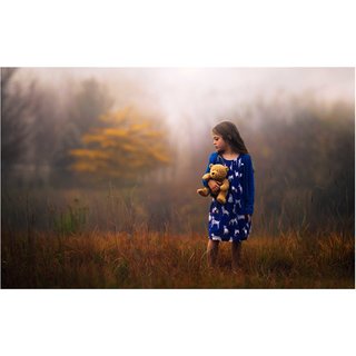 little girl with a teddy bear