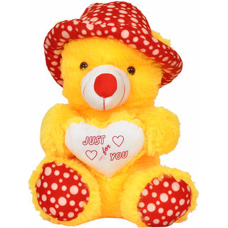 yellow teddy bear with cap