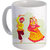 best couple playing dandiya with multi color design on