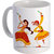 best couple playing dandiya with yellow color design on