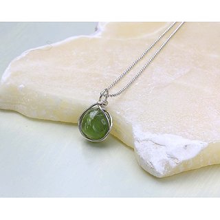 Peridot original lab certified 5.25 ratti silver Pendant without chain for astrological purpose by CEYLONMINE Peridot original lab certified 5.25 ratti silver Pendant without chain for astrological purpose by CEYLONMINE