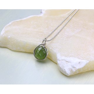                       Peridot original & lab certified 9.25 ratti silver Pendant without chain for astrological purpose by CEYLONMINE                                              