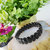 Shubhanjali Black Obsedian Stone Elastic Crystal 13mm Oval Shape Bracelet For Men  Women(Black,Standard)