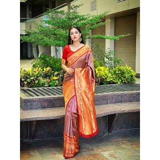                       Korvai Kanjivaran Silk sarre is Merged With Gold Zari Woven In Artistic Jaal Design in Purpal Color with Red Zari Border                                              
