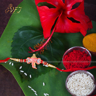                       Vighnaharta Vakratund Ganesh Gold and Rhodium Plated Alloy Rakhi for Lovely Brother                                              