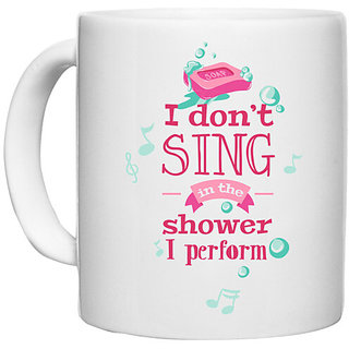                       UDNAG White Ceramic Coffee / Tea Mug 'Shower | I dont sing in the shower I perform' Perfect for Gifting [330ml]                                              