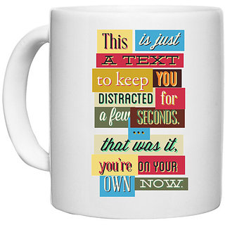                       UDNAG White Ceramic Coffee / Tea Mug 'Meme | All is Just a text to keep you distracted' Perfect for Gifting [330ml]                                              