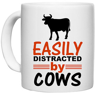                       UDNAG White Ceramic Coffee / Tea Mug 'Cows | easily distracted by cows' Perfect for Gifting [330ml]                                              