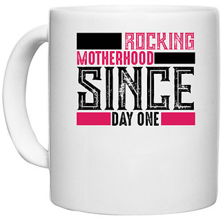                       UDNAG White Ceramic Coffee / Tea Mug 'Mother | ROCKING MOTHERHOOD SINCE DAY ONE' Perfect for Gifting [330ml]                                              