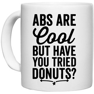                       UDNAG White Ceramic Coffee / Tea Mug '| abs are cool but have you tried donuts' Perfect for Gifting [330ml]                                              