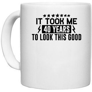                       UDNAG White Ceramic Coffee / Tea Mug '40 Years | IT TOOK ME 40 YEARS TO LOOK THIS GOOD' Perfect for Gifting [330ml]                                              