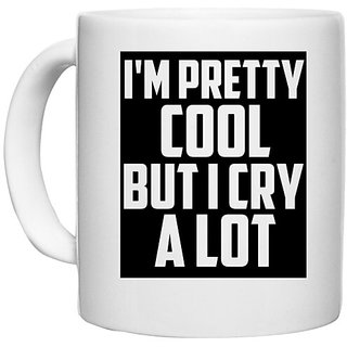                       UDNAG White Ceramic Coffee / Tea Mug 'Pretty Cool | I am pretty coll but i cry a lot' Perfect for Gifting [330ml]                                              