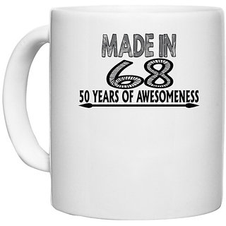                       UDNAG White Ceramic Coffee / Tea Mug 'Awesomeness | made in 68' Perfect for Gifting [330ml]                                              