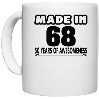                       UDNAG White Ceramic Coffee / Tea Mug 'Awesomeness | made in 69' Perfect for Gifting [330ml]                                              