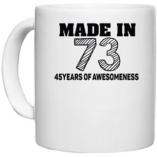                       UDNAG White Ceramic Coffee / Tea Mug 'Awesomeness | made in 73 45 years of awesomeness' Perfect for Gifting [330ml]                                              
