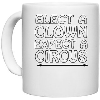                       UDNAG White Ceramic Coffee / Tea Mug '| elect a clown expect a circus' Perfect for Gifting [330ml]                                              