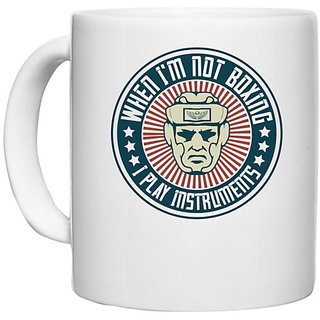                       UDNAG White Ceramic Coffee / Tea Mug 'Boxing | When I'm not boxing, I play instruments' Perfect for Gifting [330ml]                                              