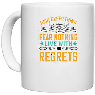                       UDNAG White Ceramic Coffee / Tea Mug 'Swimming | RISK EVERYTHING FEAR NOTHING' Perfect for Gifting [330ml]                                              