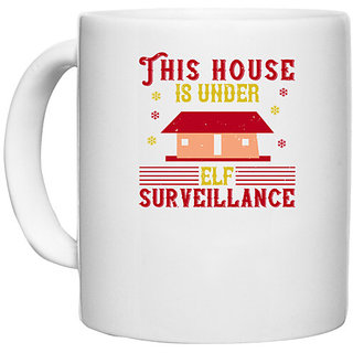                       UDNAG White Ceramic Coffee / Tea Mug 'Christmas | This house is under elf surveillance' Perfect for Gifting [330ml]                                              