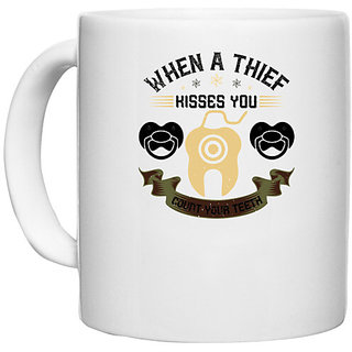                       UDNAG White Ceramic Coffee / Tea Mug 'Dentist | When a thif kisses you count your teeth' Perfect for Gifting [330ml]                                              