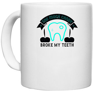                       UDNAG White Ceramic Coffee / Tea Mug 'Dentist | Too much candy broke my teeth' Perfect for Gifting [330ml]                                              