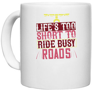                       UDNAG White Ceramic Coffee / Tea Mug 'Rider | lifes too short to ride busy roads' Perfect for Gifting [330ml]                                              