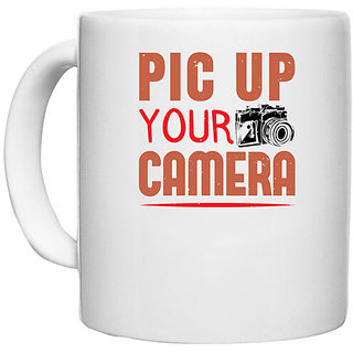                       UDNAG White Ceramic Coffee / Tea Mug 'Cameraman | PIC UP YOUR CAMERA' Perfect for Gifting [330ml]                                              