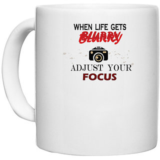                       UDNAG White Ceramic Coffee / Tea Mug 'Camerman | When Life gets blurry adjust your focus' Perfect for Gifting [330ml]                                              