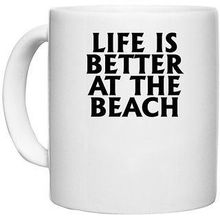                      UDNAG White Ceramic Coffee / Tea Mug 'Beach | life is better at the' Perfect for Gifting [330ml]                                              