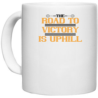                       UDNAG White Ceramic Coffee / Tea Mug 'Badminton | The road to victory is uphill' Perfect for Gifting [330ml]                                              