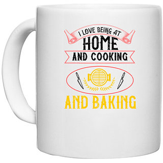                       UDNAG White Ceramic Coffee / Tea Mug 'Cooking | i love being at home and cooking and baking' Perfect for Gifting [330ml]                                              