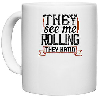                       UDNAG White Ceramic Coffee / Tea Mug 'Cooking | they see me rolling they hatin' Perfect for Gifting [330ml]                                              