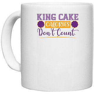                       UDNAG White Ceramic Coffee / Tea Mug 'Mardi Gras | King cake calories don't count' Perfect for Gifting [330ml]                                              