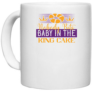                       UDNAG White Ceramic Coffee / Tea Mug 'Mardi Gras | Nobody puts baby in the king cake' Perfect for Gifting [330ml]                                              