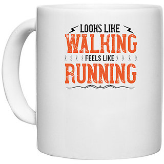                       UDNAG White Ceramic Coffee / Tea Mug 'Running | looks like walking feels like running' Perfect for Gifting [330ml]                                              