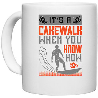                       UDNAG White Ceramic Coffee / Tea Mug 'Surfing | Its a cakewalk, when you know how' Perfect for Gifting [330ml]                                              