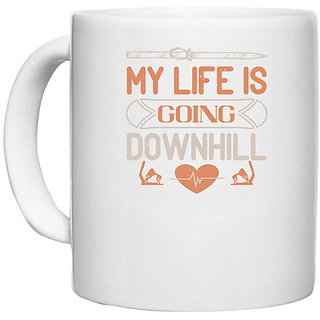                       UDNAG White Ceramic Coffee / Tea Mug 'Skiing | My life is going downhill' Perfect for Gifting [330ml]                                              