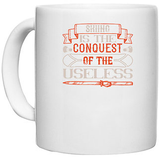                       UDNAG White Ceramic Coffee / Tea Mug 'Skiing | Skiing is the conquest of the useless' Perfect for Gifting [330ml]                                              