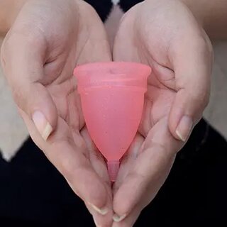 Reusable Menstrual Cup Used By Womens and Girls During The Time Of Their Menstrual Cycle Reusable Menstrual Cup Used By Womens and Girls During The Time Of Their Menstrual Cycle