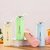 nice white glass water bottle with hand ring 400ml (Set of 1)