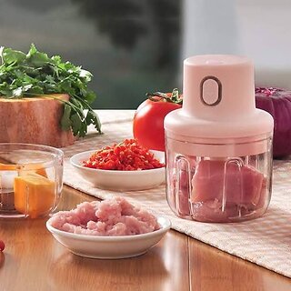 Mini Portable Electric Chopper is a USB-rechargeable, compact, BPA-free cutter for fruits and veggies. Ideal for easy c Mini Portable Electric Chopper is a USB-rechargeable, compact, BPA-free cutter for fruits and veggies. Ideal for easy c