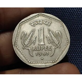 one rupees 1991 noida mint rare coin fine condition one rupees 1991 noida mint rare coin fine condition