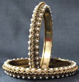 Pearl two line golden bangle