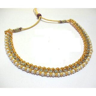                       Golden pearl and stone necklace                                              